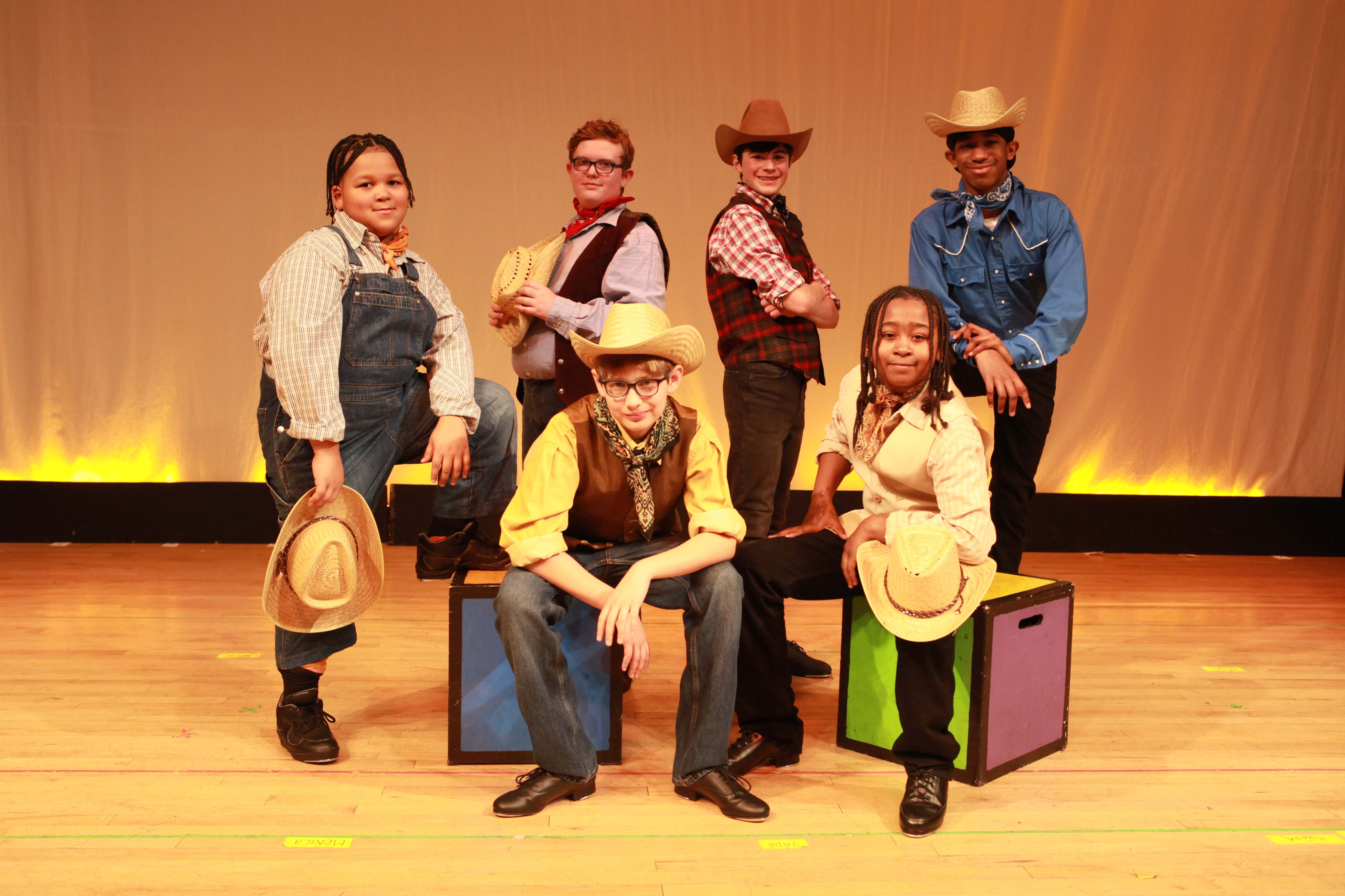 Students in costume performing